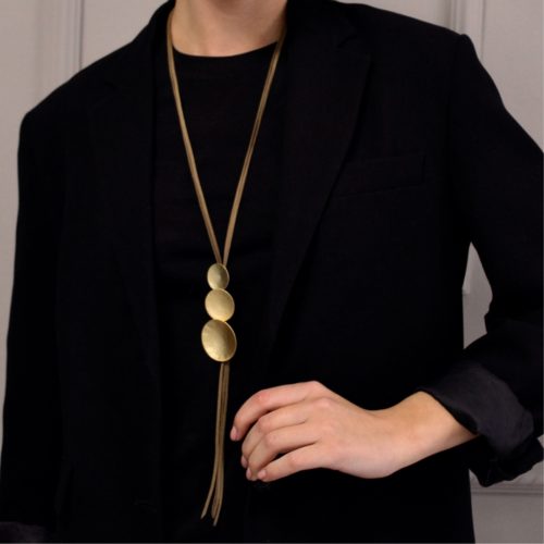 long necklace leather and 3
round gold disks