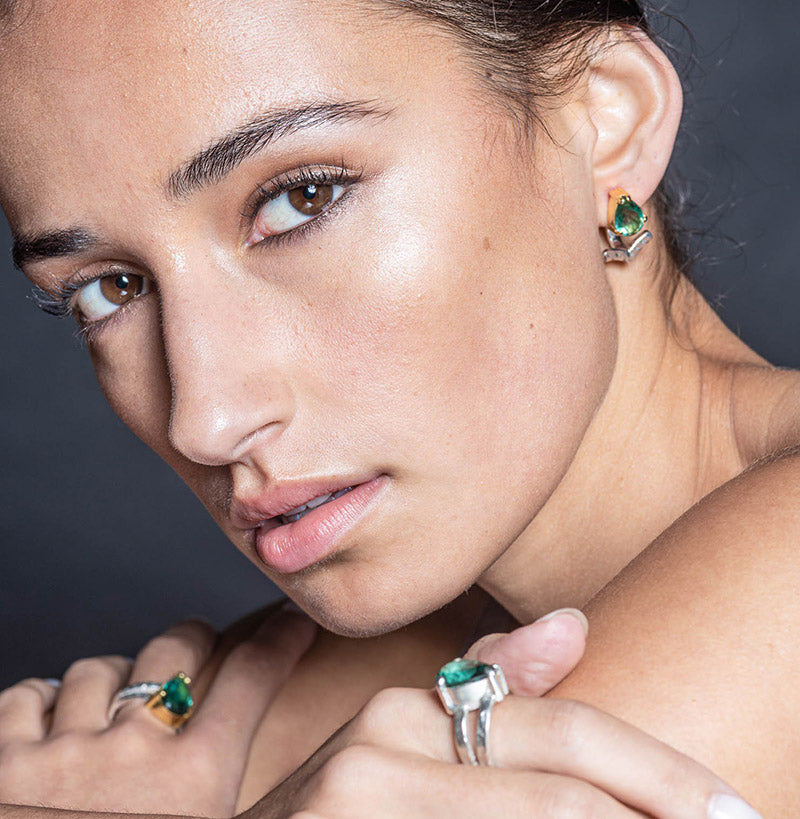 model wears  green quartz and silver earrings